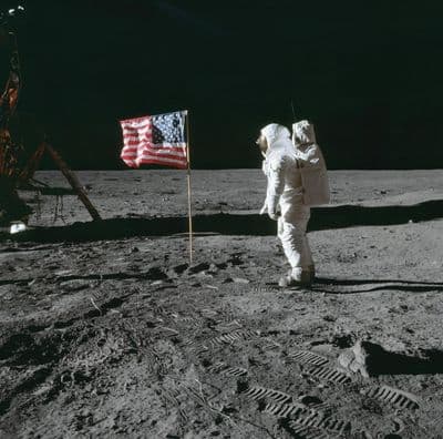 Buzz Aldrin salutes the US flag (AS11-40-5874).