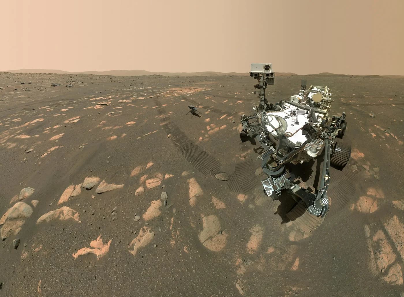 Perseverance photographed itself with the Ingenuity helicopter, about 3.9 m away, on 6 April 2021 (sol 46); the selfie is stitched from 62 WATSON images.