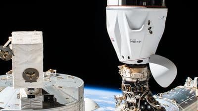 The SpaceX Dragon crew spacecraft approaches the International Space Station