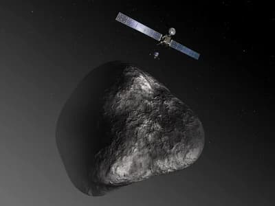 Umělecká představa vzniklá ještě před příletem: orbitální sonda Rosetta vypouští přistávací modul Philae ke kometě. Obrázek není v měřítku; skutečný dvoulaločný tvar komety se ukázal až v roce 2014.