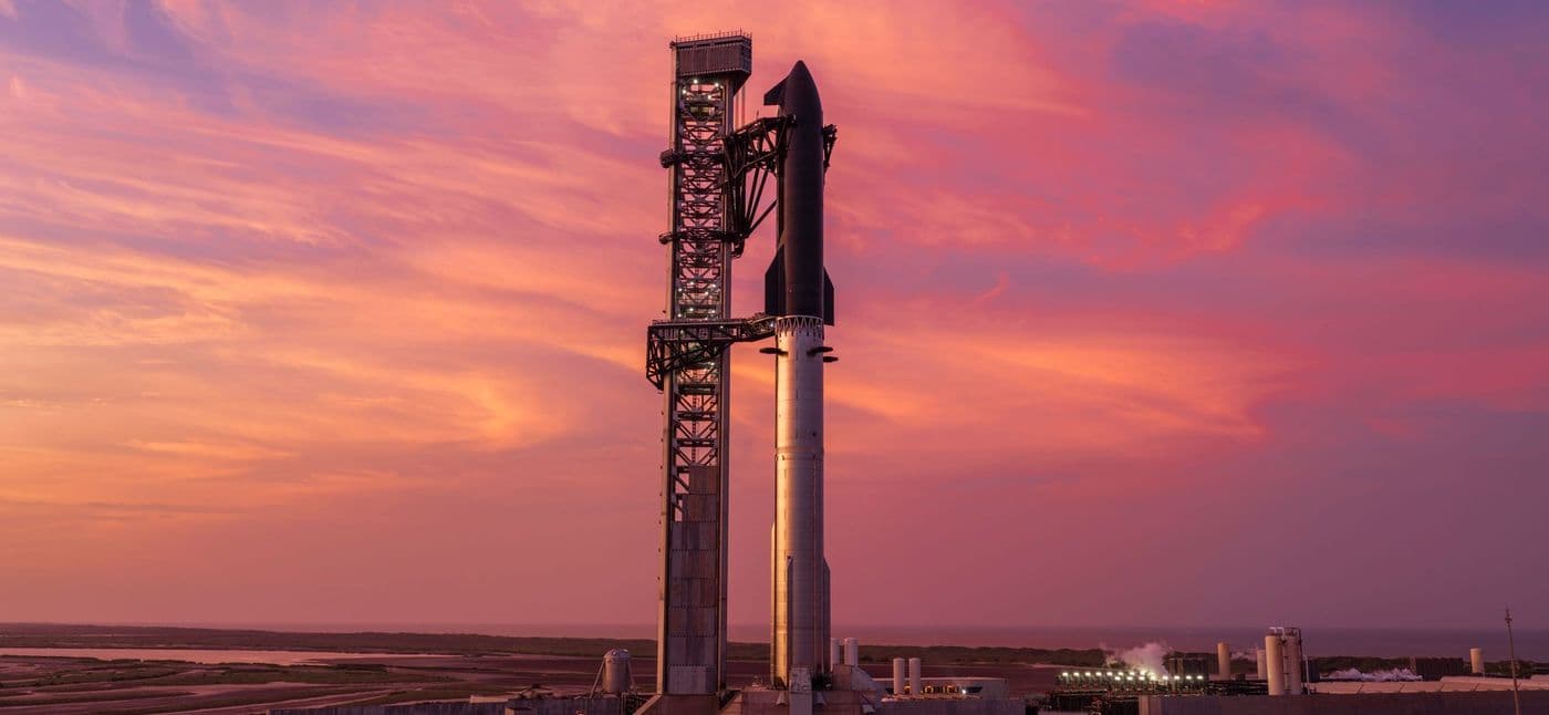 The Flight 13 stack on the pad at sunset before its 24 July 2026 launch.
