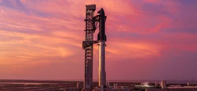 The Flight 13 stack on the pad at sunset before its 24 July 2026 launch.