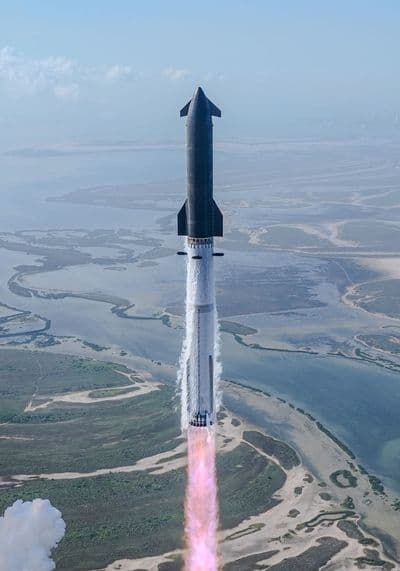 Vertical view of Starship and Super Heavy during Flight 12 over Starbase