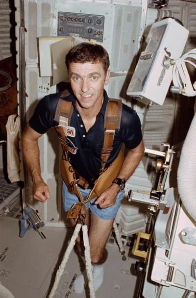 Joe Engle exercises on Columbia’s middeck during STS-2.