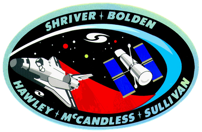 Znak mise STS-31 s Hubbleovým dalekohledem.
